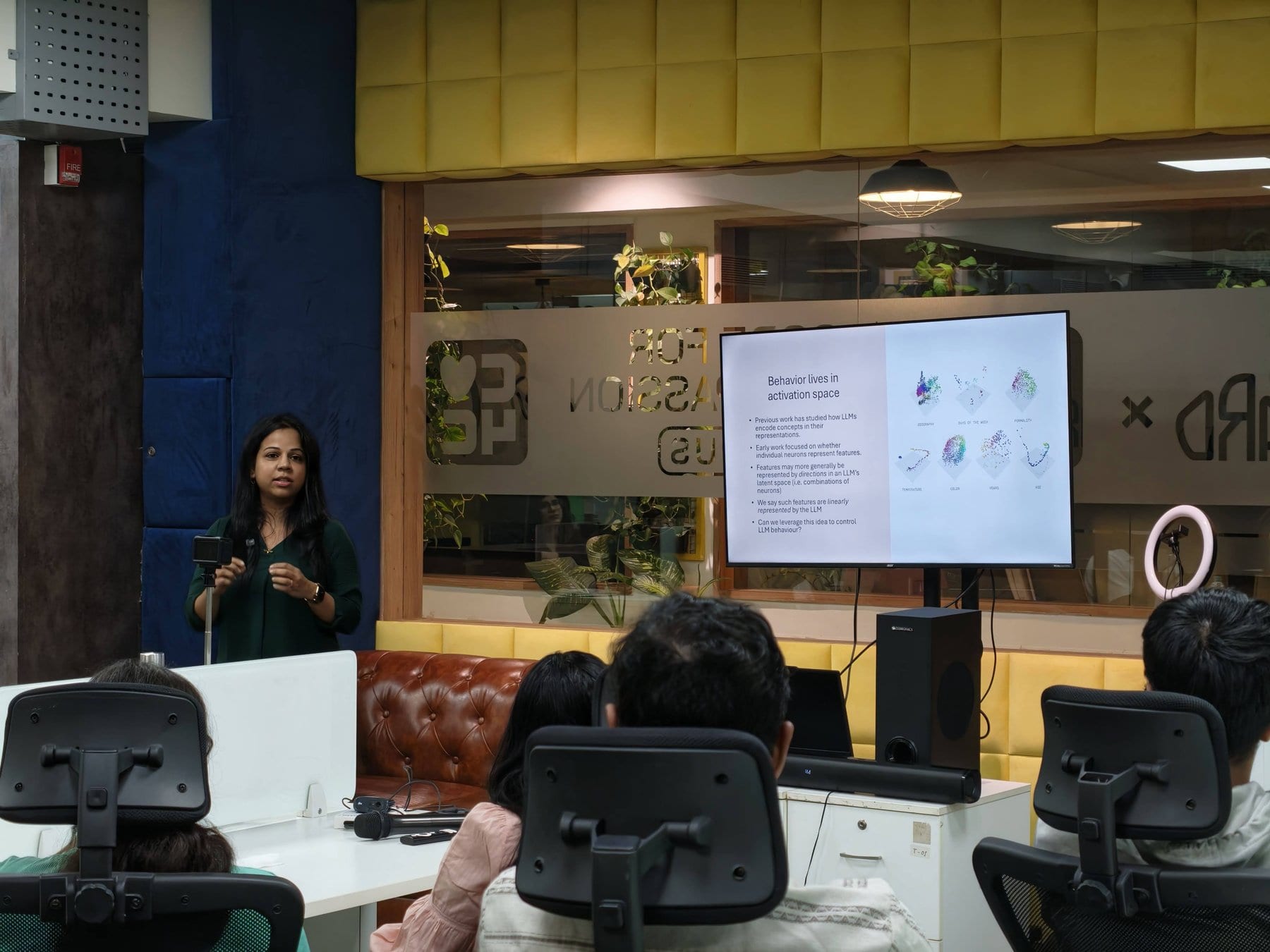 Anusha presenting at a speaker session.