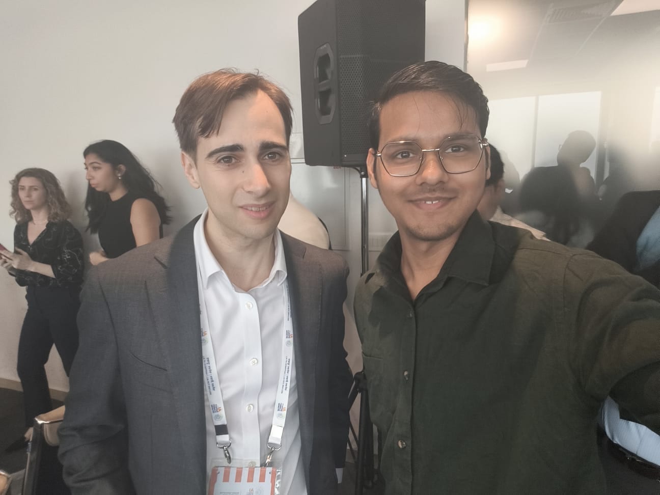 Aditya Raj with Adam Gleave, CEO of FAR AI, at the India AI Impact Summit 2026.