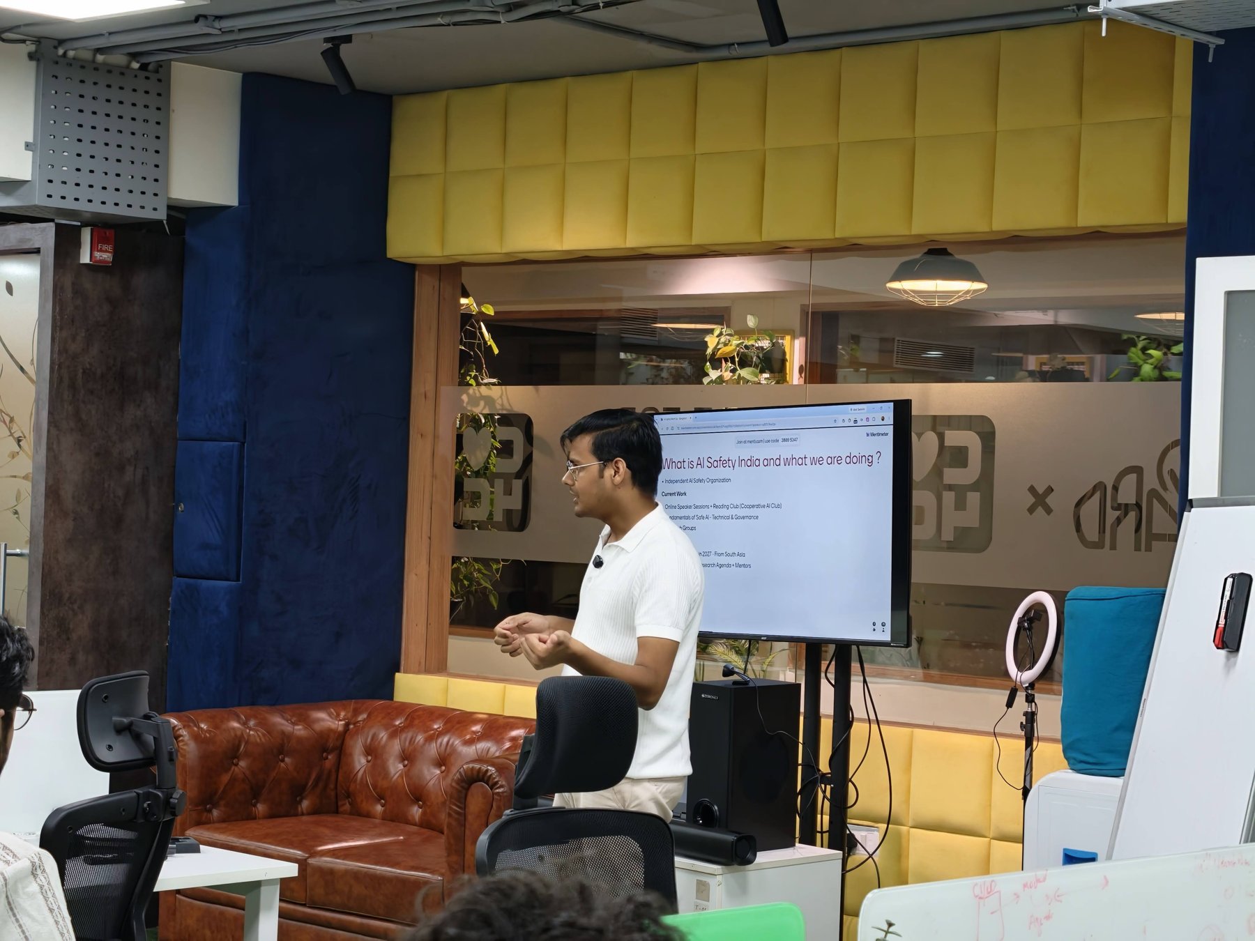 Aditya Raj giving a keynote at an AI Safety India session in Bangalore